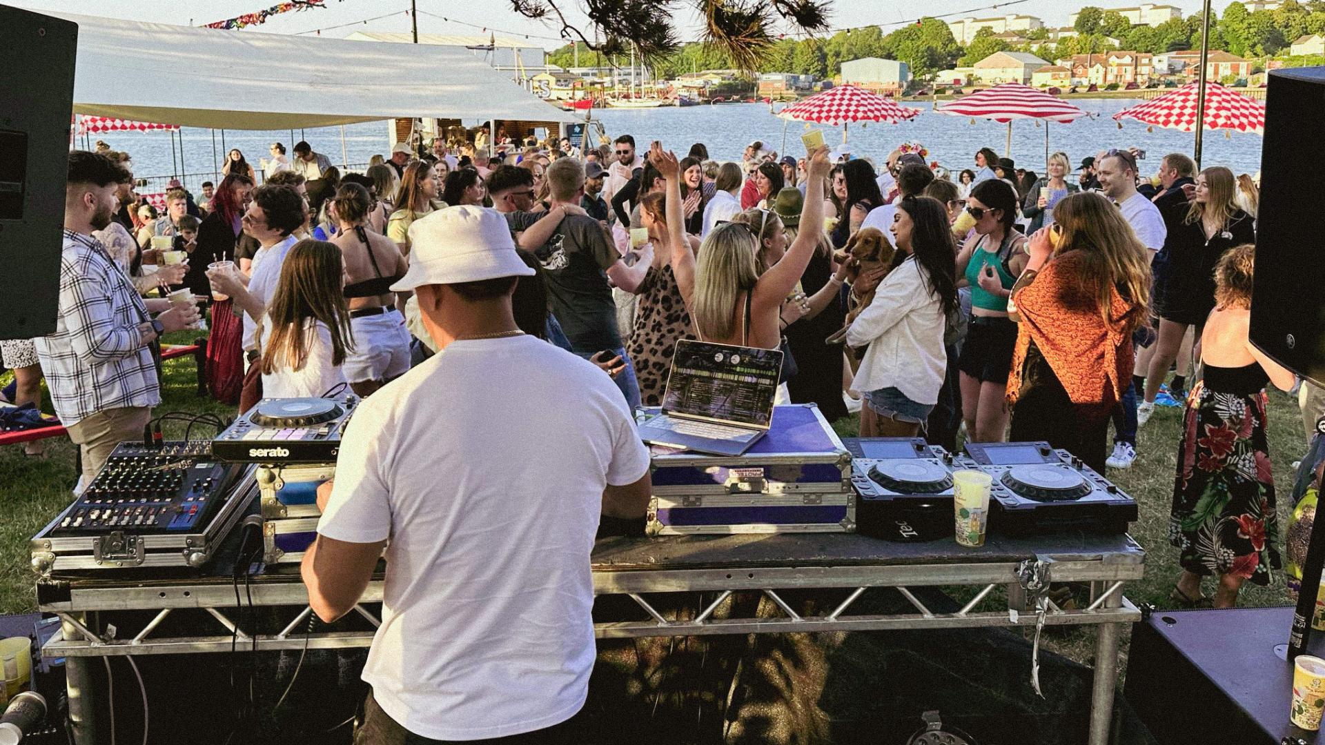 a dj behind the decks