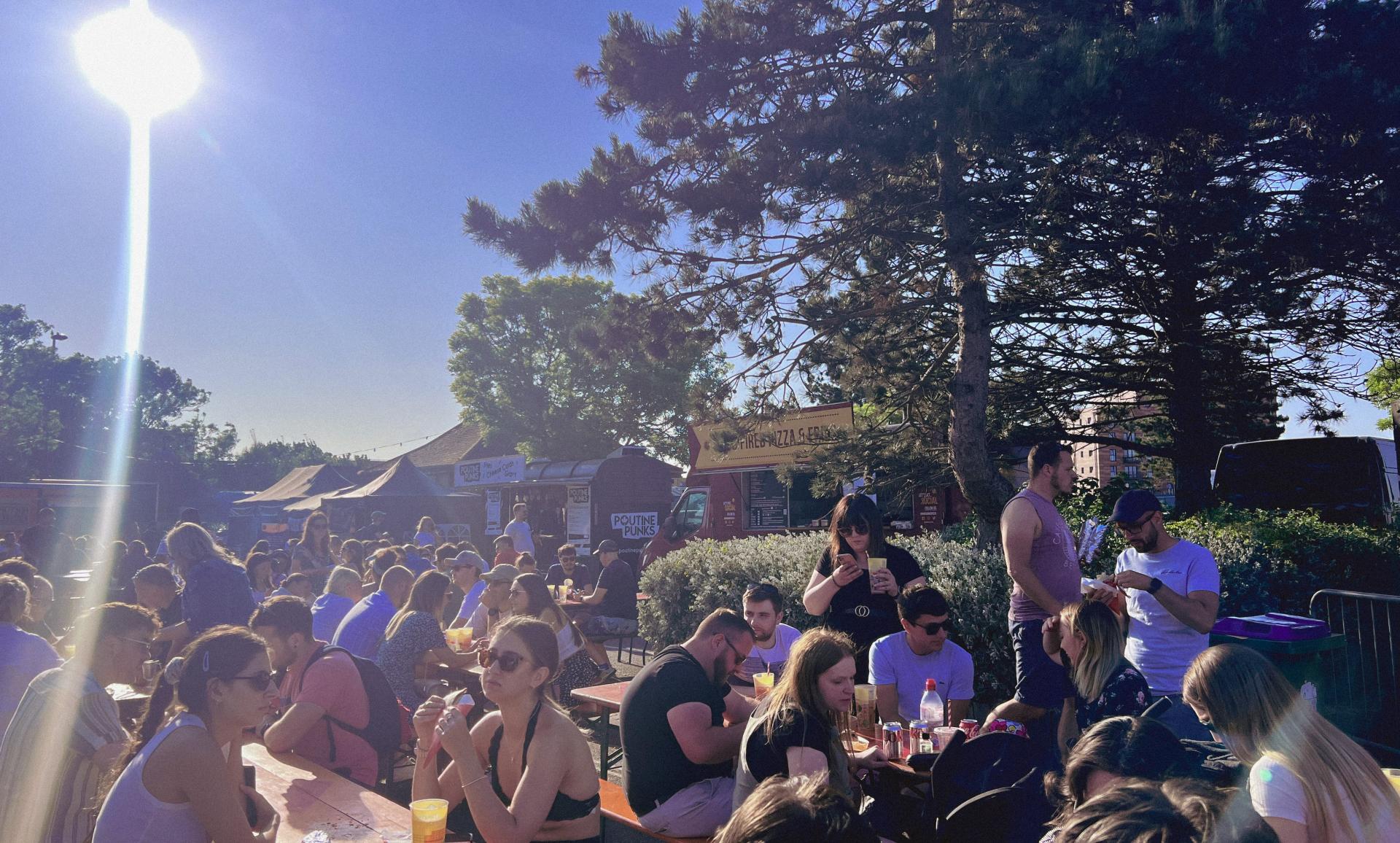 people enjoying the sun with some drinks