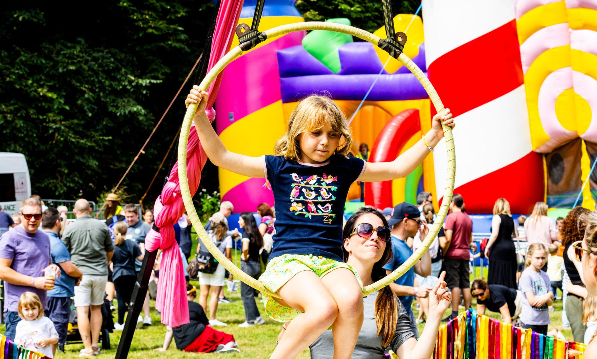 child playing with circus ring